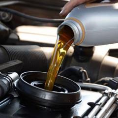 oil being poured into engine